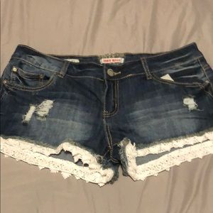 Brand new without tags jean shorts with lace trim